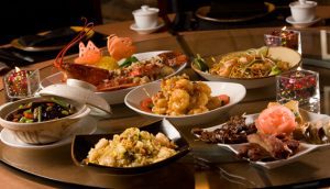 A variety of Asian food dishes on table